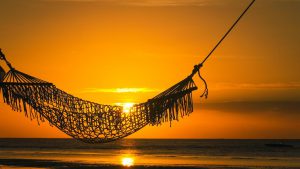 Hammock with sunset behind